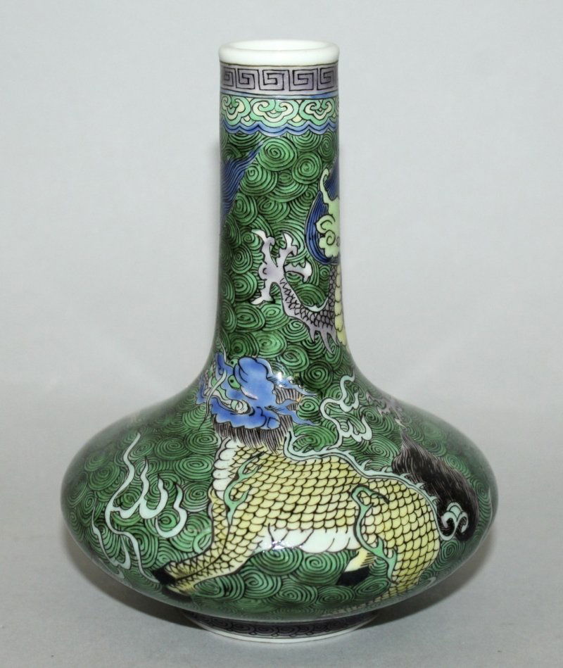 A SMALL FAMILLE VERTE PORCELAIN BOTTLE VASE, decorated (1 of 3)