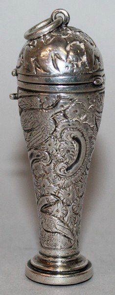 A LATE VICTORIAN SILVER DESK SEAL with hinged dome: A LATE VICTORIAN SILVER DESK SEAL with hinged dome cover and suspension ring, London 1875, maker Thomas Johnson, the end with circular monogrammed bloodstone intaglio with ovoid grip with foliate deco