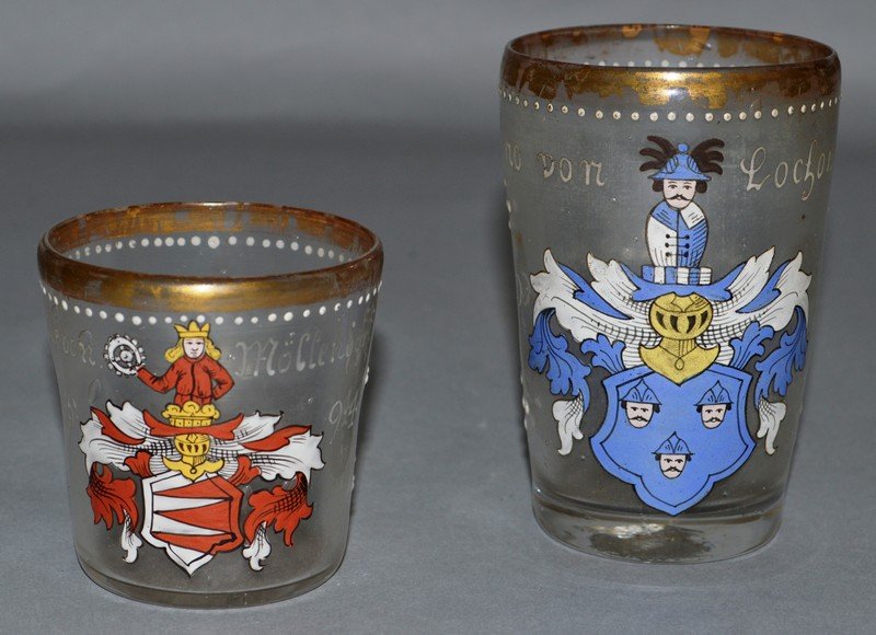 TWO SMALL EARLY CONTINENTAL BEAKERS painted enamel: TWO SMALL EARLY CONTINENTAL BEAKERS painted enamel decoration, both crested and dated 1594. 3.5ins and 2.25ins high.