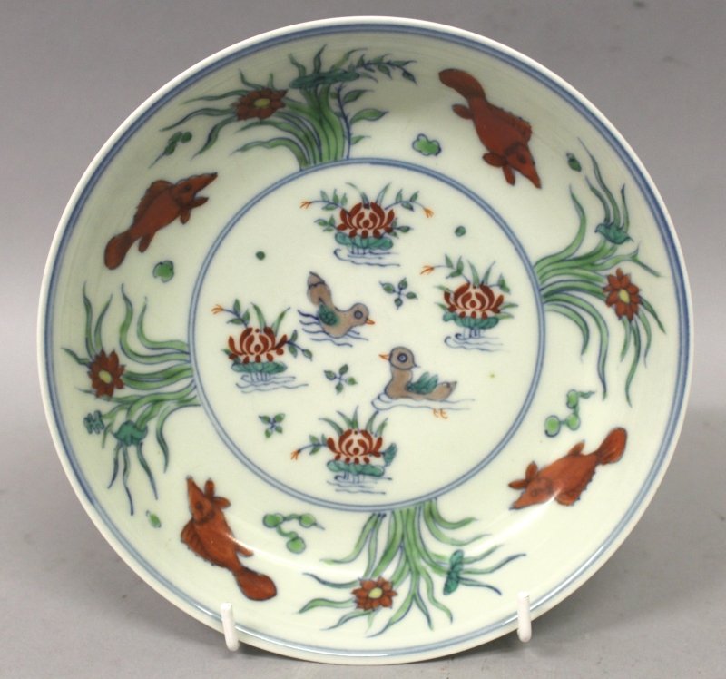 A CHINESE DOUCAI PORCELAIN DISH, decorated with ducks (1 of 3)
