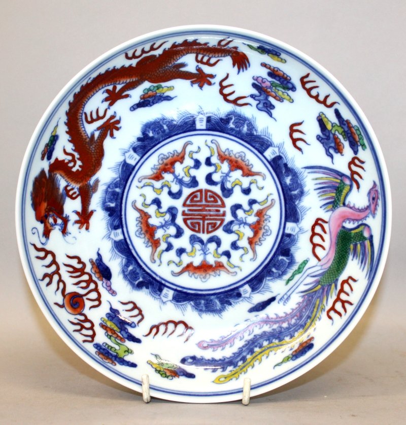 A CHINESE DOUCAI PORCELAIN SAUCER DISH, the interior (1 of 2)
