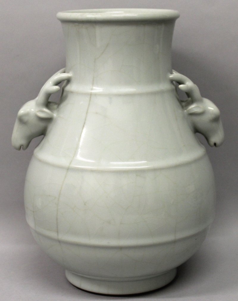 A CHINESE CELADON CRACKLEGLAZE PORCELAIN HU VASE, the (1 of 6)