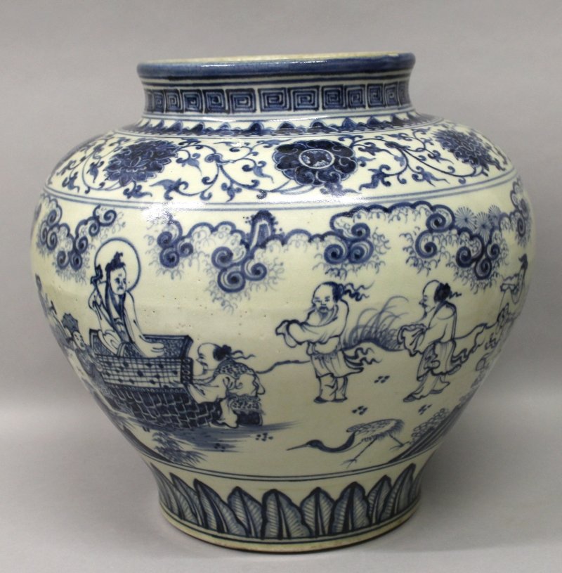 A LARGE CHINESE MING STYLE BLUE & WHITE PORCELAIN JAR,: A LARGE CHINESE MING STYLE BLUE & WHITE PORCELAIN JAR, the sides decorated between formal borders with a continuous scene of Immortals and attendants, the base unglazed, 13.25in high. 150-250