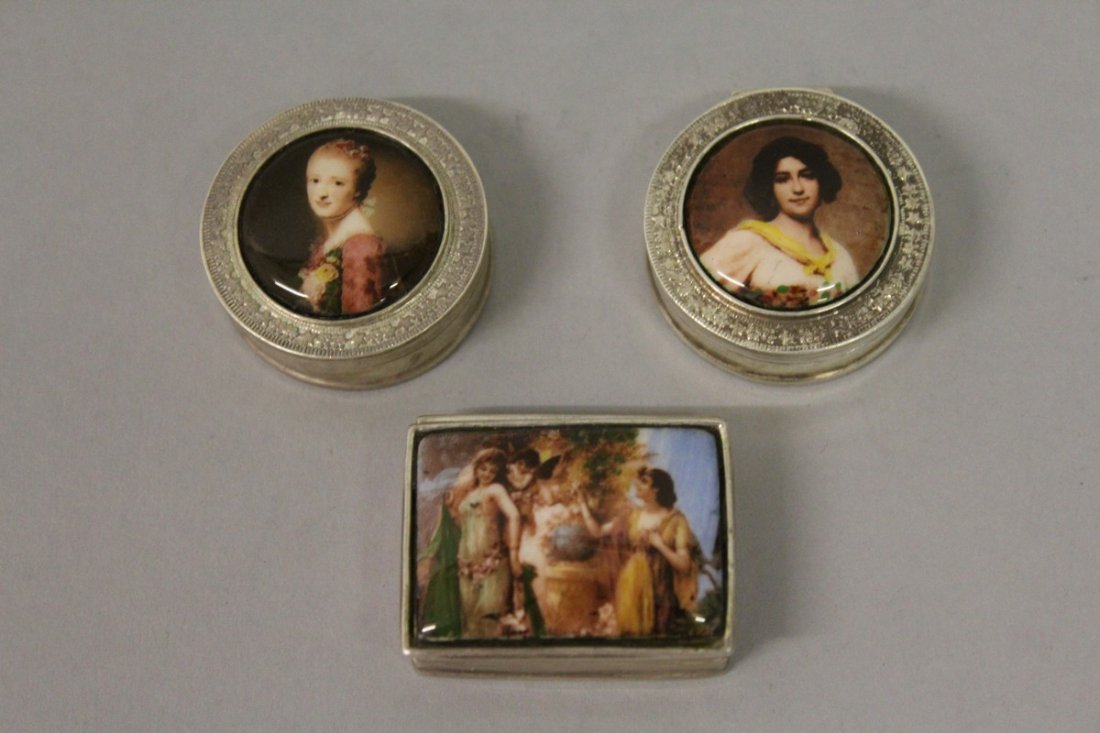 THREE SMALL SILVER AND ENAMEL PILL BOXES. £60-80: THREE SMALL SILVER AND ENAMEL PILL BOXES. £60-80