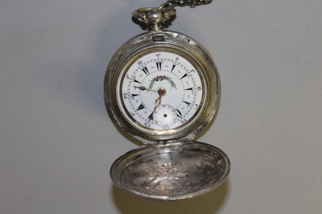 A FRENCH .800 SILVER ENGRAVED POCKET WATCH. £80-100: A FRENCH .800 SILVER ENGRAVED POCKET WATCH. £80-100