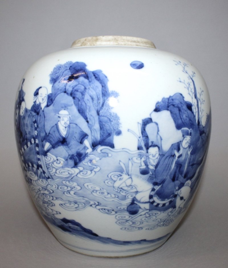 A CHINESE BLUE & WHITE PORCELAIN GINGER JAR, the: A CHINESE BLUE & WHITE PORCELAIN GINGER JAR, the rounded sides decorated with a continuous scene of Immortals in a rocky landscape setting, 8.7in high. 200-300