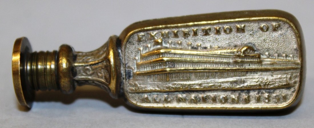 A COMMEMORATIVE BRASS SEAL 1851 EXHIBITION CRYSTAL: A COMMEMORATIVE BRASS SEAL 1851 EXHIBITION CRYSTAL PALACE, the oval intaglio seal dated 1851