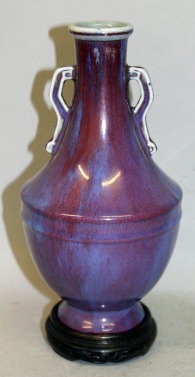 A CHINESE FLAMBE GLAZED PORCELAIN VASE, together with a (1 of 7)