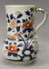 AN EARLY JAPANESE IMARI PORCELAIN TANKARD, circa 1700,