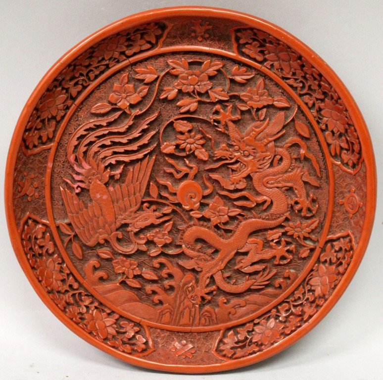 A CHINESE RED CINNABAR LACQUER TYPE DISH, the interior (1 of 4)