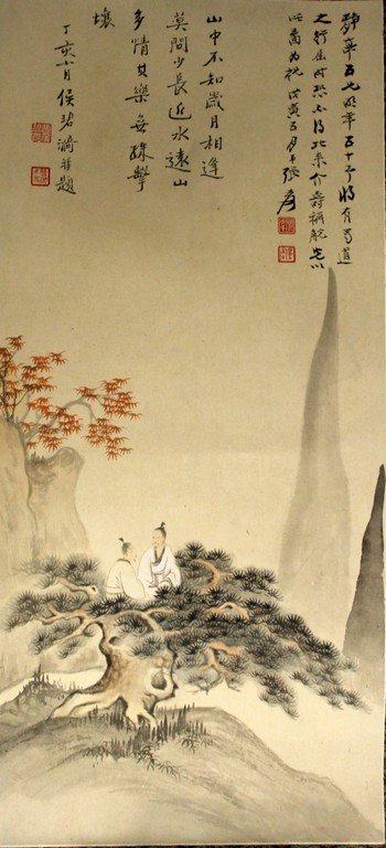 A CHINESE SCROLL PICTURE ON PAPER, within a patterned (1 of 7)