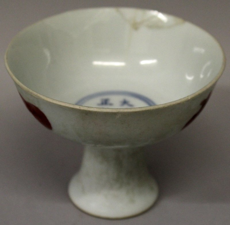A CHINESE COPPER-RED STEM BOWL, the sides decorated (1 of 7)