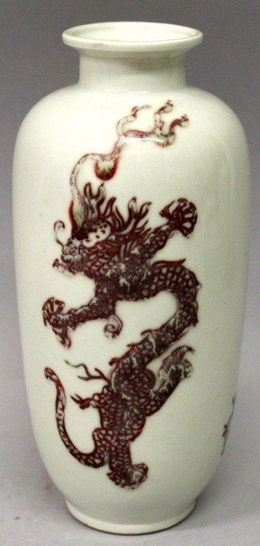 A CHINESE COPPER-RED DRAGON VASE, the tall ovoid body (1 of 6)