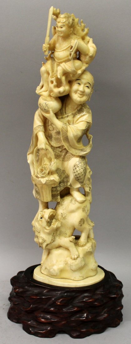 A LARGE JAPANESE MEIJI PERIOD IVORY OKIMONO, together (1 of 9)