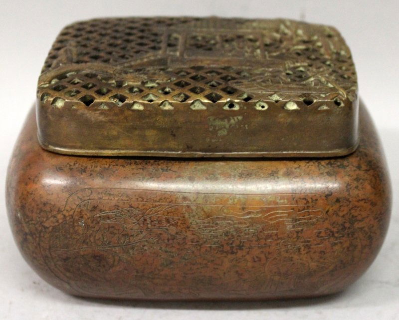 A CHINESE BRONZE HAND WARMER & COVER, the sides with (1 of 8)