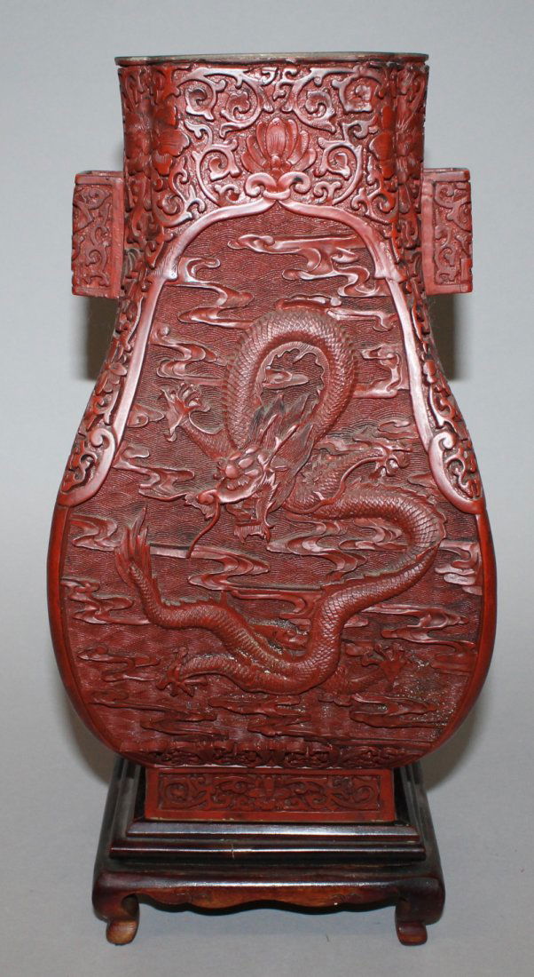 A 20TH CENTURY CHINESE RED CINNABAR LACQUER ARROW VASE, (1 of 8)