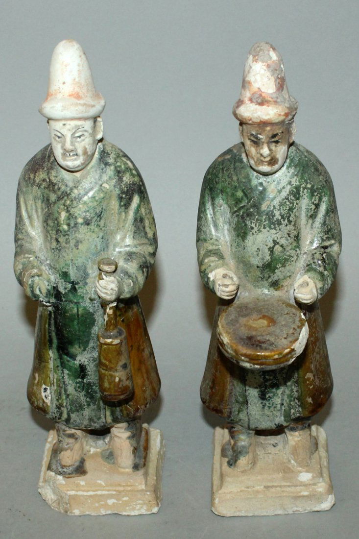 A PAIR OF CHINESE MING STYLE GLAZED POTTERY FIGURES OF (1 of 6)