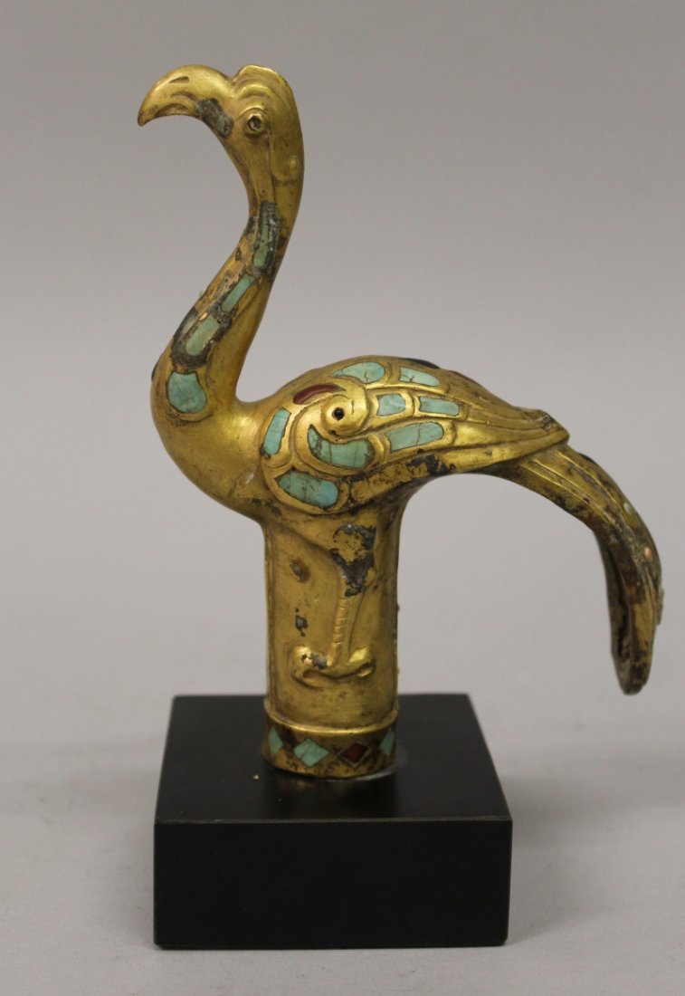 A CHINESE INLAID GILT BRONZE CANE HANDLE, of archaic (1 of 5)