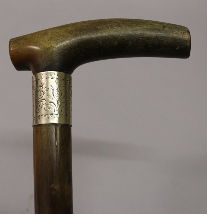 A 19TH CENTURY RHINOCEROS HORN HANDLED WOOD WALKING (1 of 5)