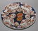 AN EARLY JAPANESE IMARI PORCELAIN DISH, circa 1700, of