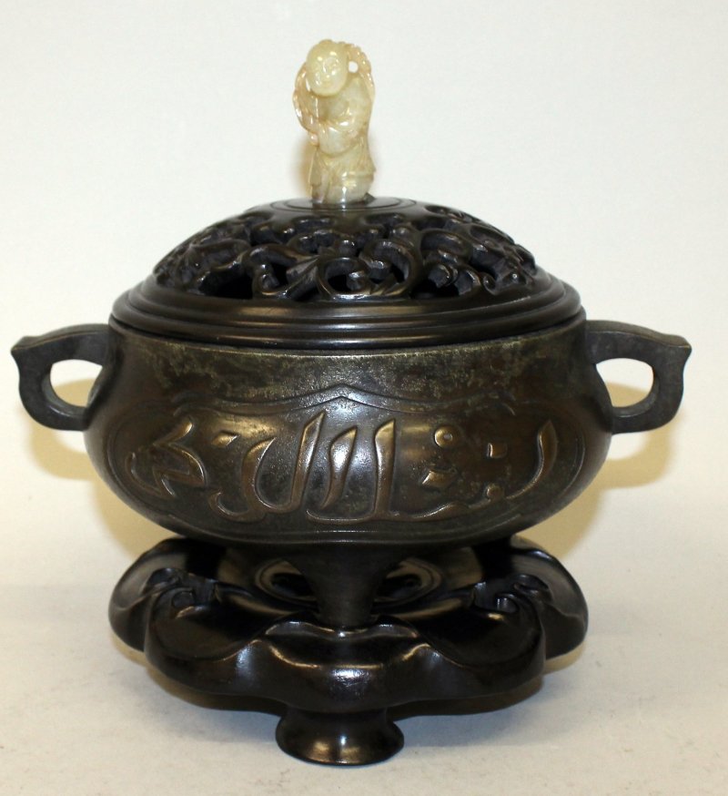 A CHINESE ISLAMIC MARKET BRONZE TRIPOD CENSER, weighing (1 of 9)