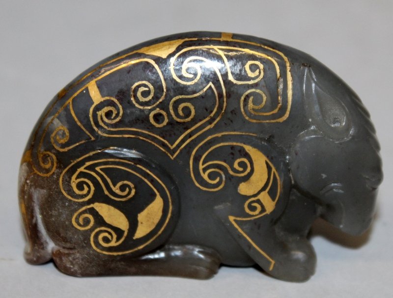 A CHINESE GILT-METAL INLAID JADE MODEL OF A MYTHICAL (1 of 5)