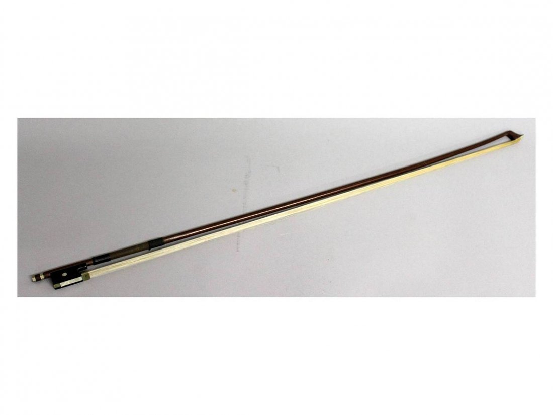 A VIOLIN BOW. Signed NICOLAS DUCHEVE (1772-1840).: A VIOLIN BOW. Signed NICOLAS DUCHEVE (1772-1840). 29.5ins long.