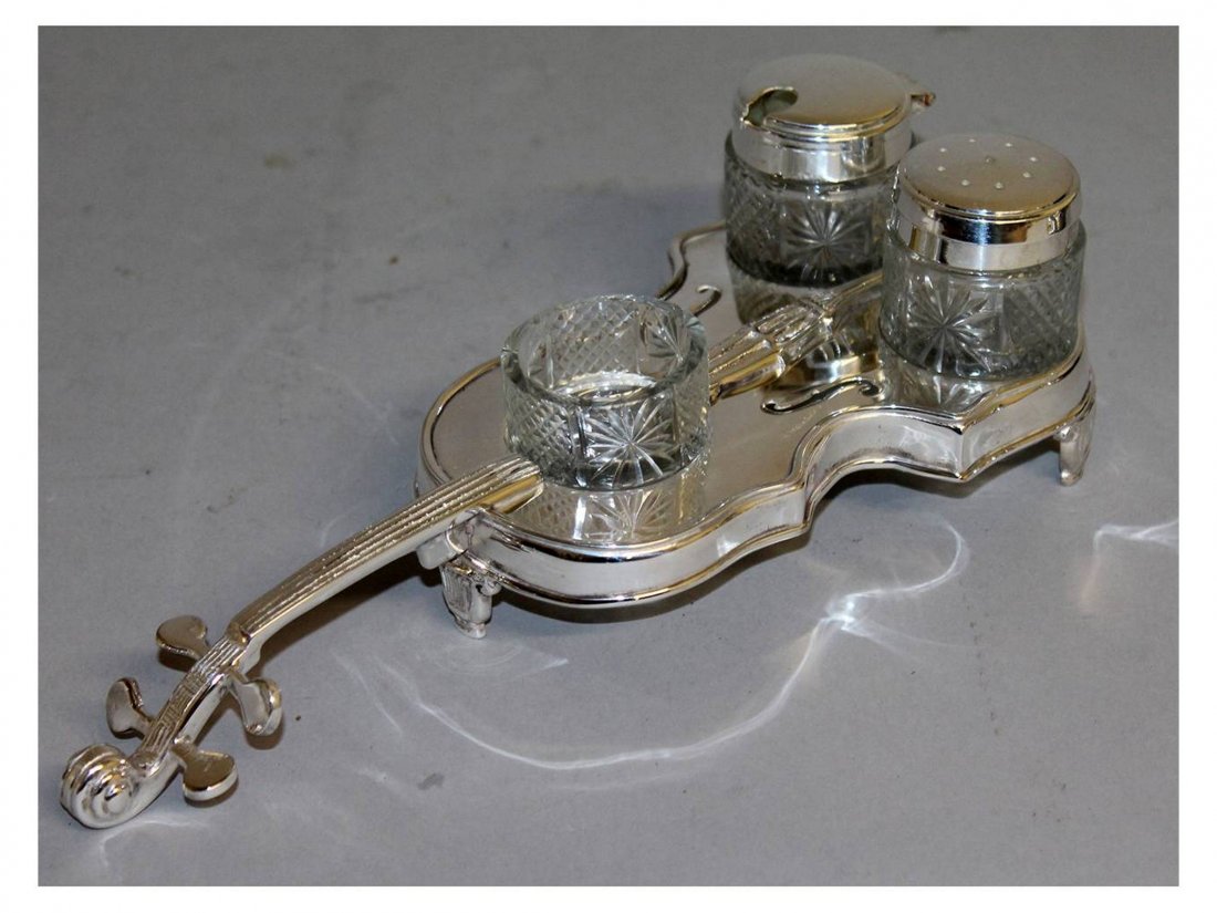 A SILVER PLATED THREE PIECE "VIOLIN SHAPED" CRUET.: A SILVER PLATED THREE PIECE "VIOLIN SHAPED" CRUET.