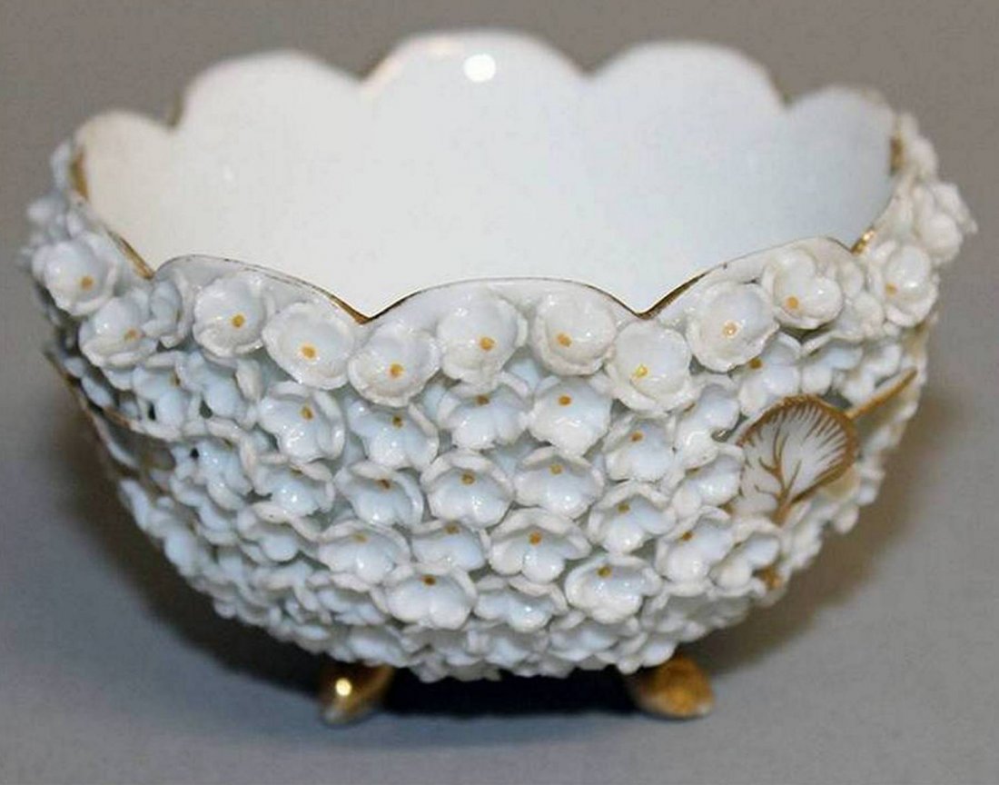 A MEISSEN SNOWBALL SALT encrusted with flowers.: A MEISSEN SNOWBALL SALT encrusted with flowers.