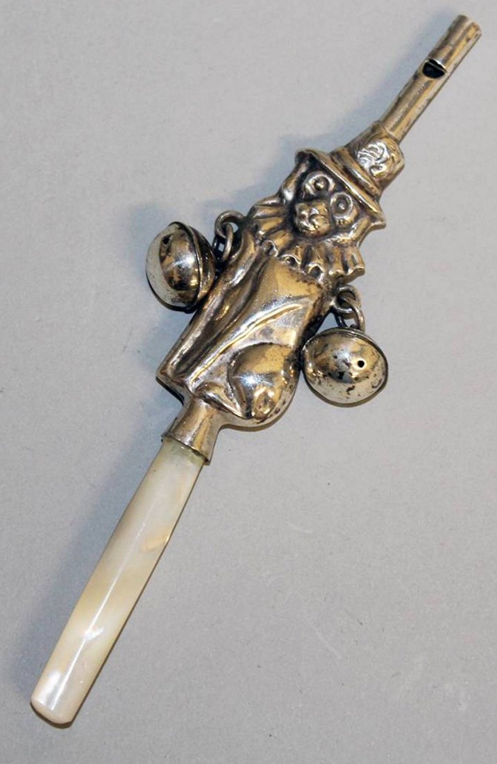 A BABIES "MONKEY" SILVER AND MOTHER-OF-PEARL RATTLE.: A BABIES "MONKEY" SILVER AND MOTHER-OF-PEARL RATTLE.