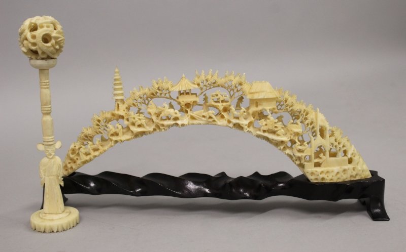 AN EARLY 20TH CENTURY CHINESE PIERCED IVORY BRIDGE, (1 of 4)