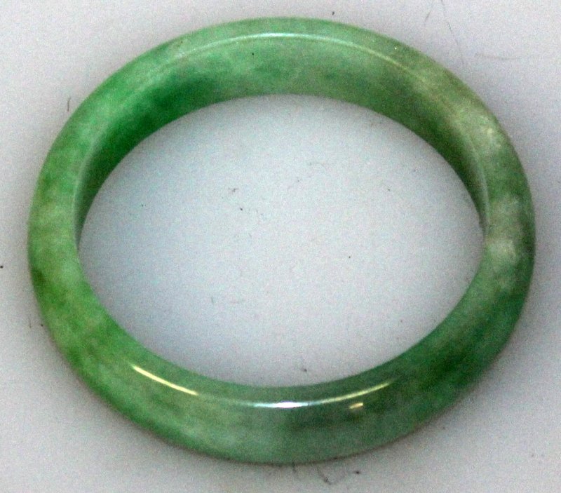ANOTHER GOOD QUALITY GREEN JADE BANGLE, with paler (1 of 2)