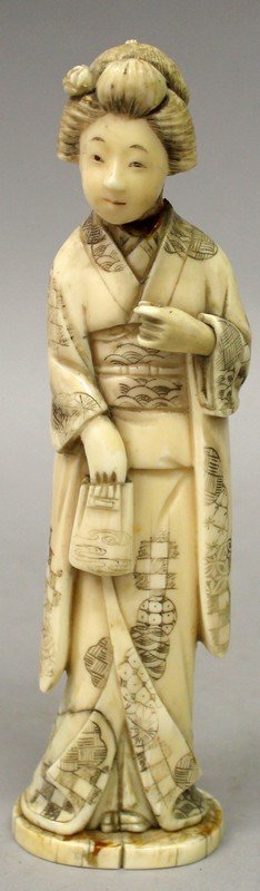 A SIGNED JAPANESE MEIJI PERIOD IVORY OKIMONO OF A: A SIGNED JAPANESE MEIJI PERIOD IVORY OKIMONO OF A BIJIN, standing in engraved robes and holding a purse, the base with an engraved signature, 7.1in high. John Nicholsons Auctioneers do not ship items