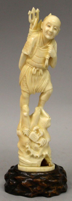 A SIGNED JAPANESE MEIJI PERIOD IVORY OKIMONO OF A (1 of 10)