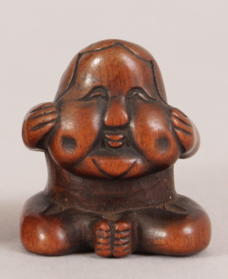A JAPANESE MEIJI PERIOD CARVED BOXWOOD NETSUKE OF A (1 of 5)