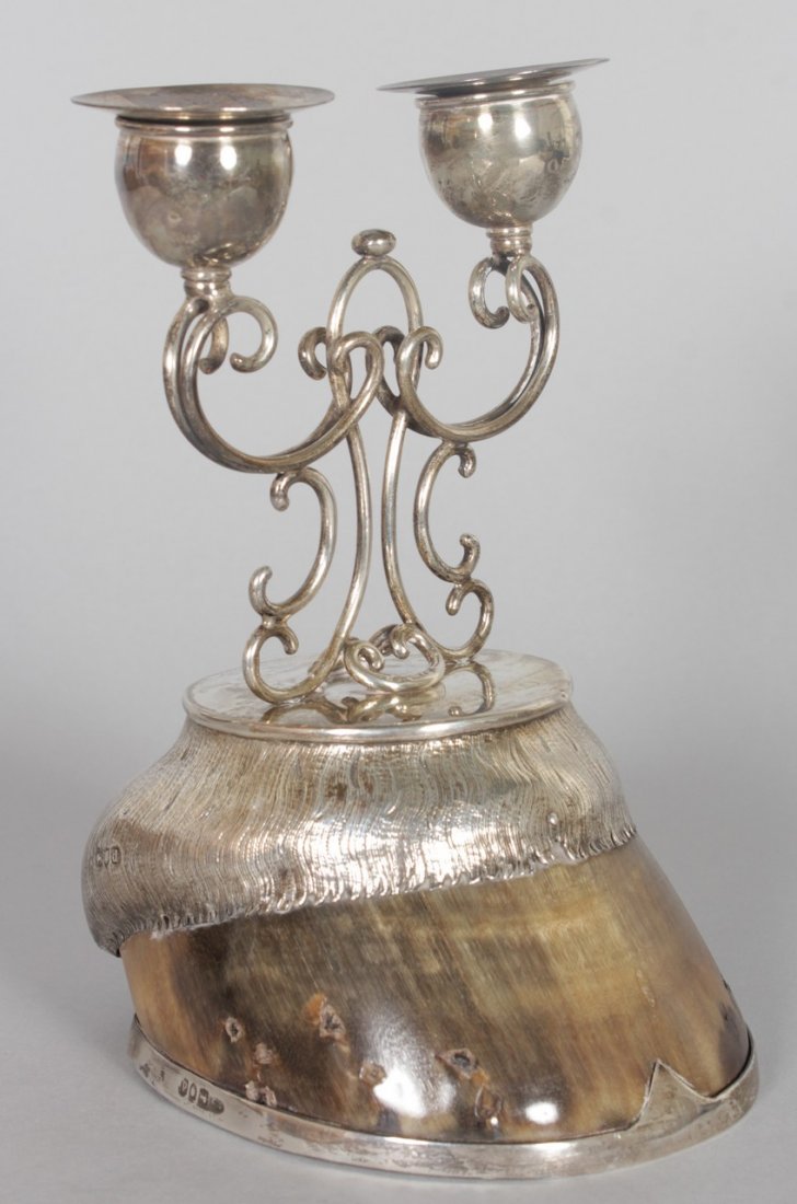 A SILVER MOUNTED HOOF "BALLAD" DOUBLE CANDLESTICK.: A SILVER MOUNTED HOOF "BALLAD" DOUBLE CANDLESTICK. London 1901. Retailed by Thornhill Ltd., London. 8ins high.