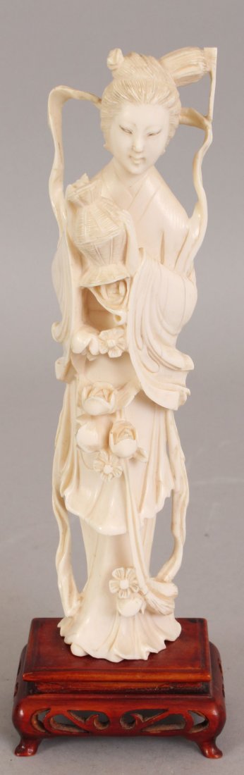 AN EARLY 20TH CENTURY CHINESE CARVED IVORY FIGURE OF (1 of 8)