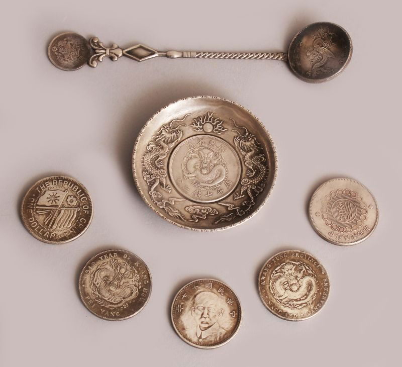 A CHINESE SILVER METAL COIN DISH, 3.1in diameter; five (1 of 10)