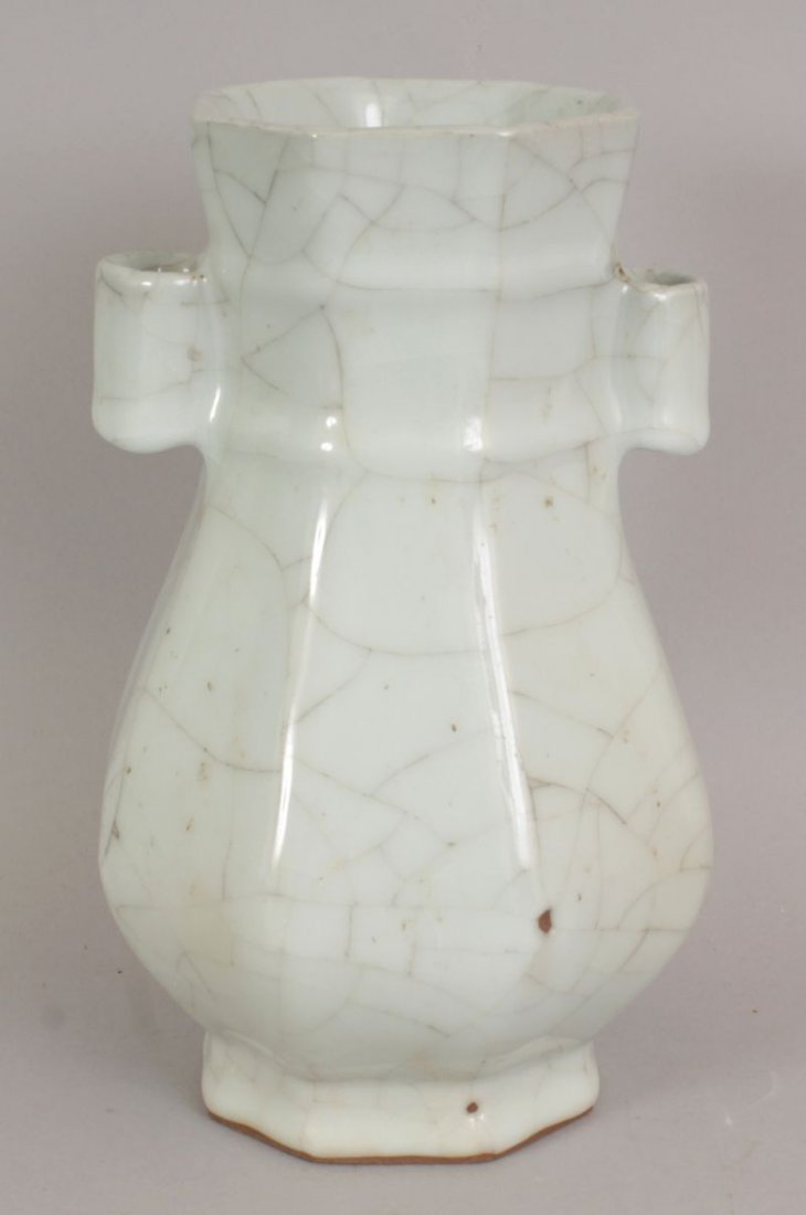 A CHINESE SONG STYLE GUAN TYPE CELADON PORCELAIN ARROW (1 of 7)