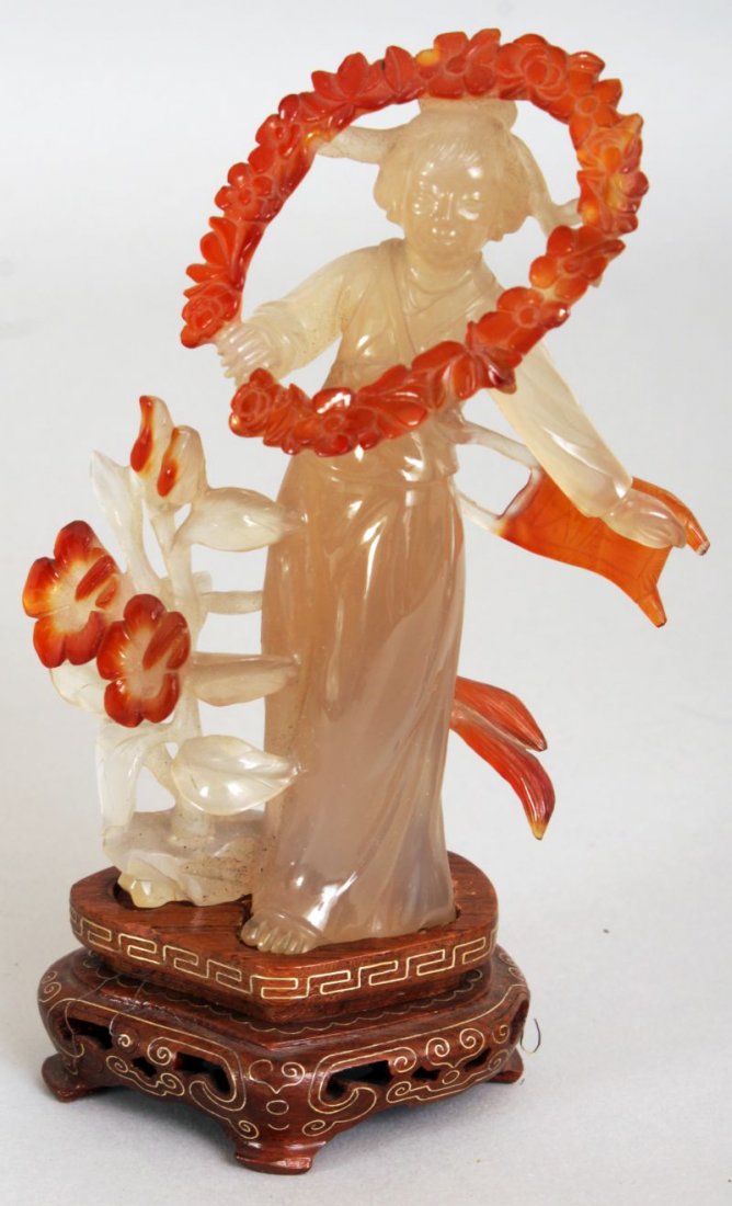 A CHINESE GREY AGATE CARVING OF A STANDING LADY HOLDING (1 of 5)