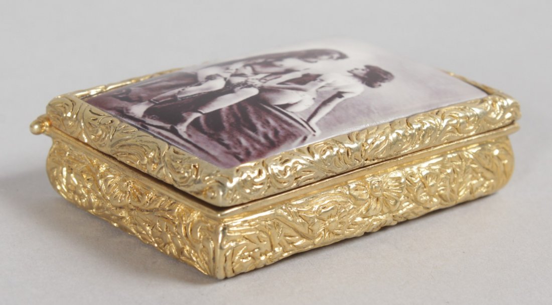 AN 18CT GOLD PLATED "SEPIA NUDE" PILL BOX.: AN 18CT GOLD PLATED "SEPIA NUDE" PILL BOX.