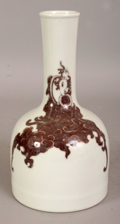 A CHINESE COPPER RED PORCELAIN BOTTLE VASE, the sides (1 of 5)
