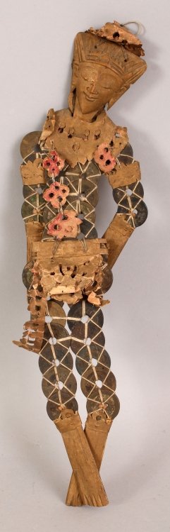 AN UNUSUAL CHINESE ARTICULATED FIGURE, formed from gilt: AN UNUSUAL CHINESE ARTICULATED FIGURE, formed from gilt wood and ‘cash’ coins, 13in long.
