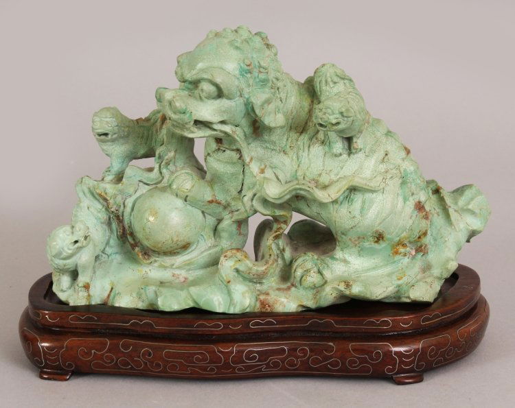 AN EARLY 20TH CENTURY CHINESE LIGHT GREEN CARVED (1 of 10)