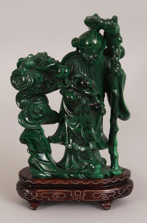 AN EARLY 20TH CENTURY CHINESE MALACHITE CARVING OF SHOU (1 of 10)