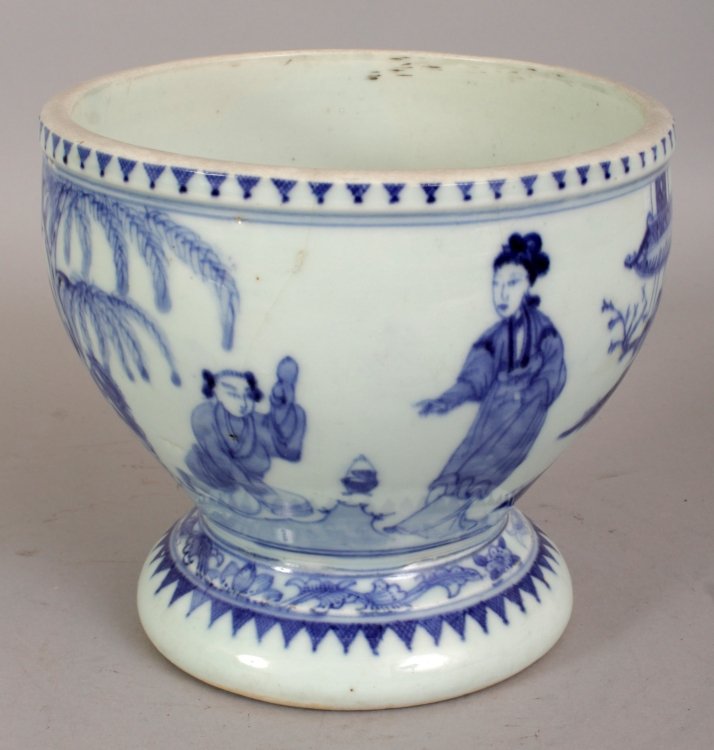 A 19TH/20TH CENTURY CHINESE BLUE & WHITE PORCELAIN: A 19TH/20TH CENTURY CHINESE BLUE & WHITE PORCELAIN FOOTED BOWL, painted with calligraphy and with a lady and boy in a river landscape setting, 6.3in diameter at rim & 5.6in high.