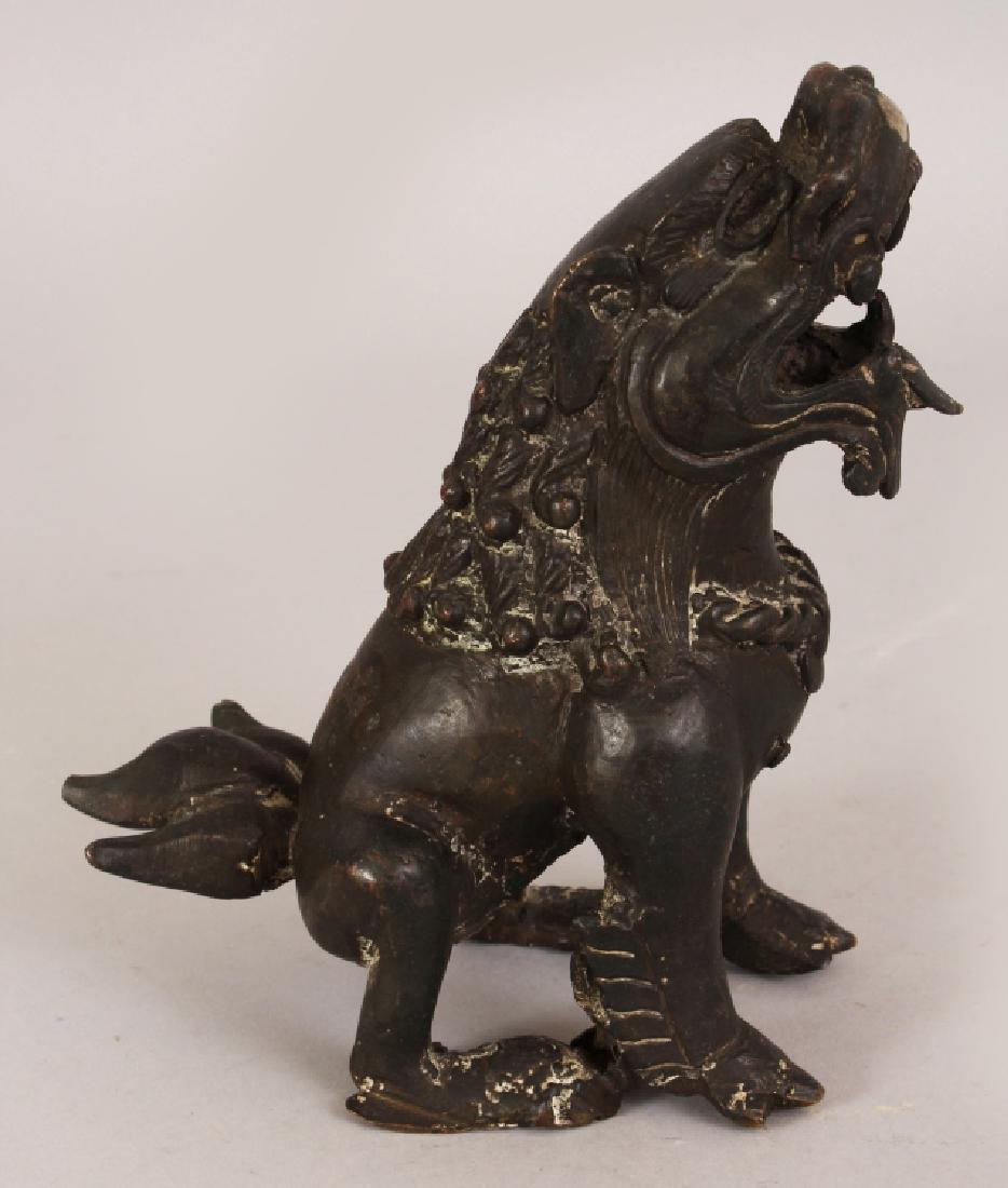 A SOUTH-EAST ASIAN BRONZE MODEL OF A LION TEMPLE (1 of 7)