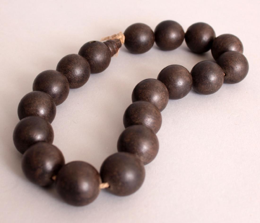 A CHINESE CHEN XIANG SPHERICAL BEAD NECKLACE, approx. (1 of 3)