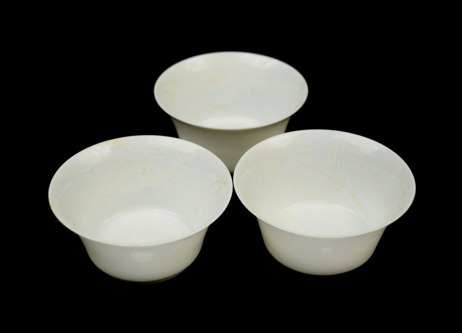 [Chinese] A Set of Three Egg Shell White Porcelain Tea: [Chinese] A Set of Three Egg Shell White Porcelain Tea Cups with Dragon Pattern, marked as "Made in Chenghua Era of Ming Dynasty" | 『大明成化年製』