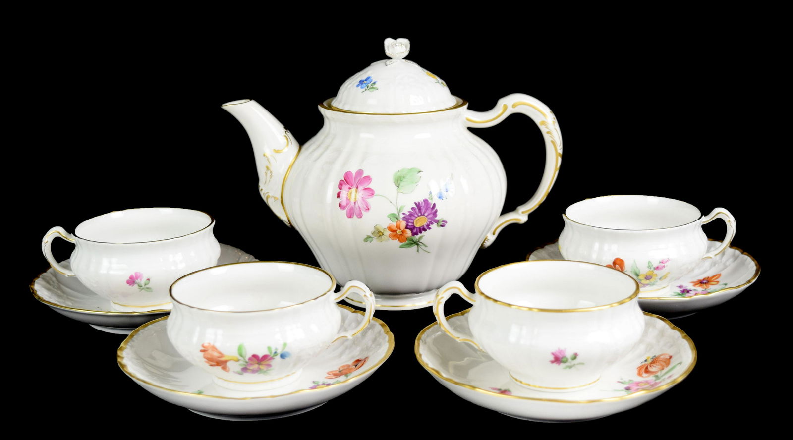 A Set of KPM White Porcelain Tea Service for Four: A Set of KPM White Porcelain Tea Service for Four with gilded trim and colourful flower patterns, includes a teapot, 4 cups, and 4 plates | KPM四人白瓷野花金&